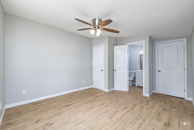 unfurnished bedroom featuring ceiling fan, connected bathroom, and light hardwood / wood-style flooring