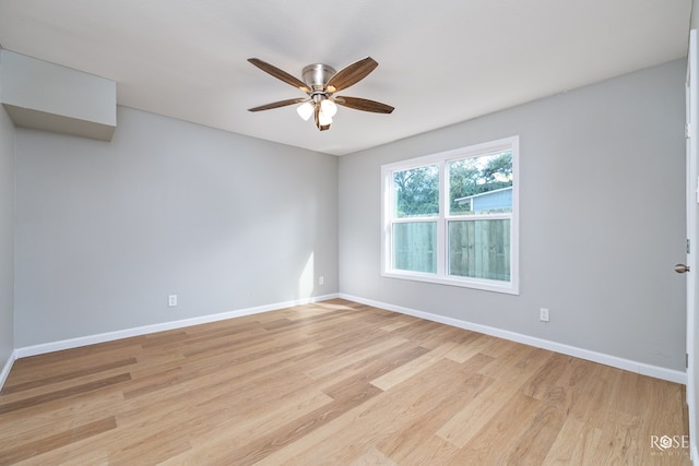 unfurnished room featuring ceiling fan and light hardwood / wood-style flooring