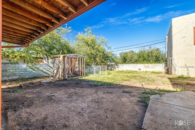 2318 Dallas St, San Angelo, TX 76901 - view of yard with an outdoor structure and a fenced backyard
