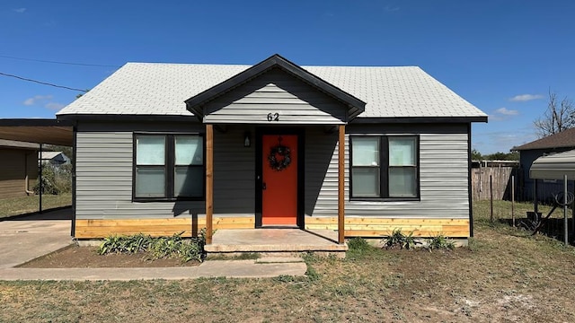 bungalow-style house with a carport