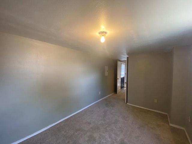 1001 S David St, San Angelo, TX 76903 - unfurnished room featuring carpet and baseboards