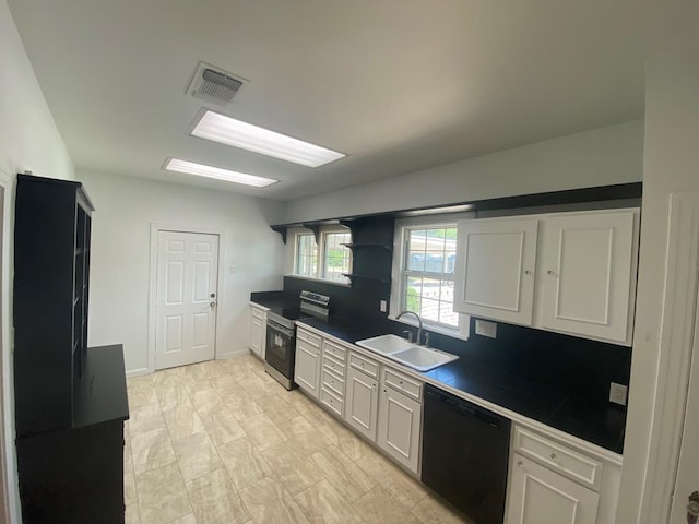 1001 S David St, San Angelo, TX 76903 - kitchen with electric range oven, black dishwasher, a sink, tile countertops, and open shelves