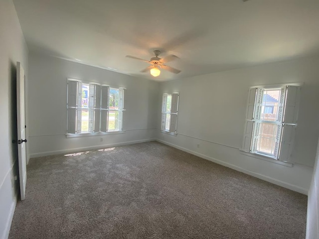 1001 S David St, San Angelo, TX 76903 - carpeted empty room featuring ceiling fan and baseboards