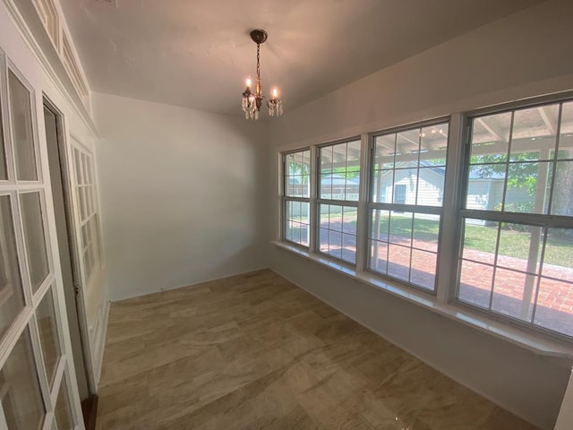 1001 S David St, San Angelo, TX 76903 - unfurnished dining area with a chandelier