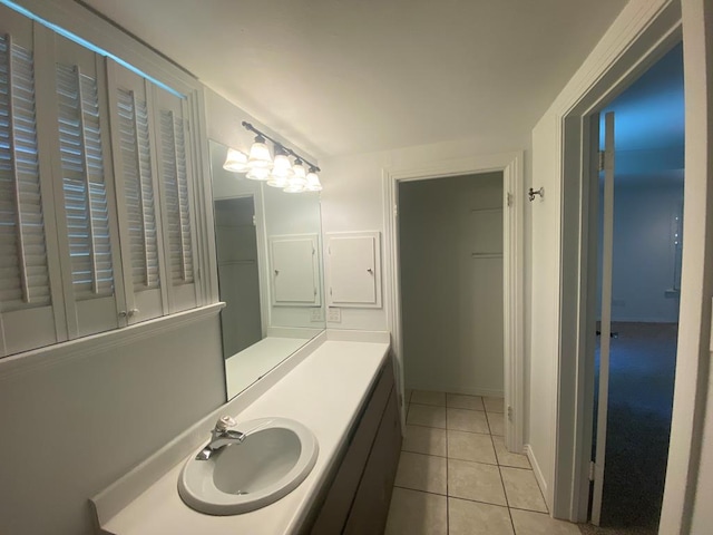 1001 S David St, San Angelo, TX 76903 - bathroom featuring tile patterned floors and vanity