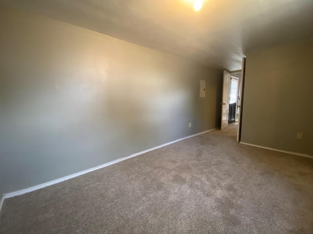1001 S David St, San Angelo, TX 76903 - unfurnished room featuring carpet flooring and baseboards