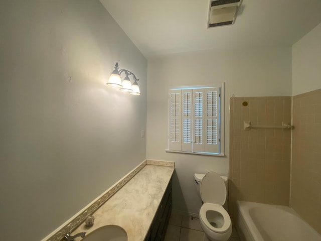 1001 S David St, San Angelo, TX 76903 - full bath with tile patterned flooring, toilet, vanity, and baseboards