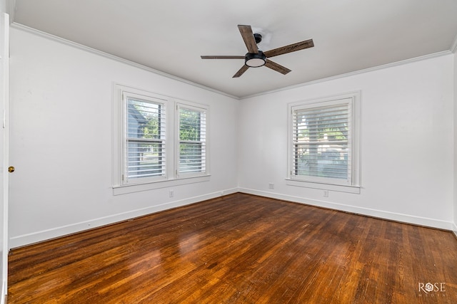 1510 Shafter St, San Angelo, TX 76901 - spare room featuring plenty of natural light, ornamental molding, ceiling fan, and dark wood-style flooring
