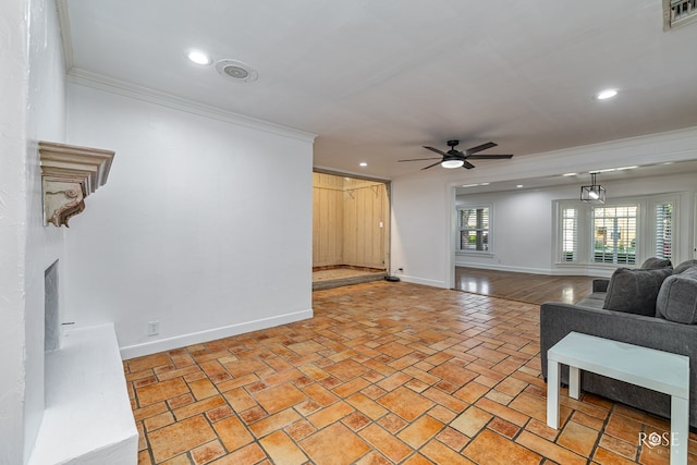 1510 Shafter St, San Angelo, TX 76901 - living area featuring crown molding, ceiling fan, recessed lighting, a fireplace with raised hearth, and brick patterned flooring