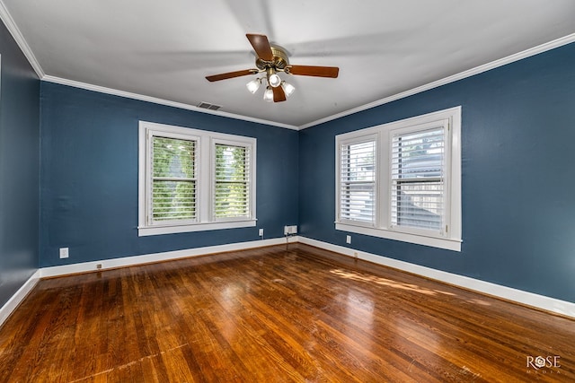1510 Shafter St, San Angelo, TX 76901 - spare room featuring healthy amount of natural light, ceiling fan, wood finished floors, and crown molding