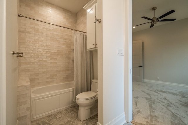 bathroom with ceiling fan, toilet, and shower / tub combo