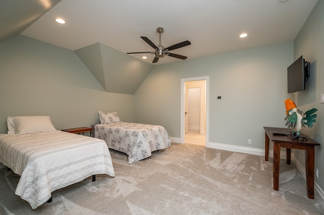 carpeted bedroom featuring lofted ceiling and ceiling fan