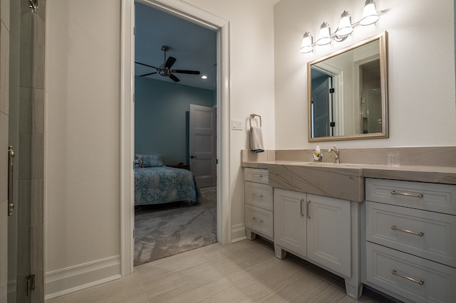 bathroom featuring vanity and ceiling fan