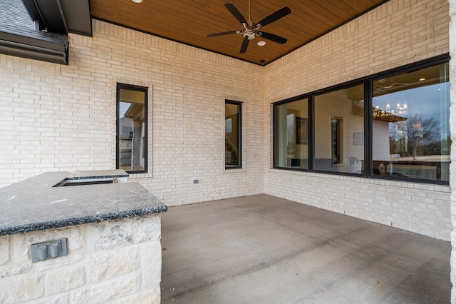 view of patio with ceiling fan