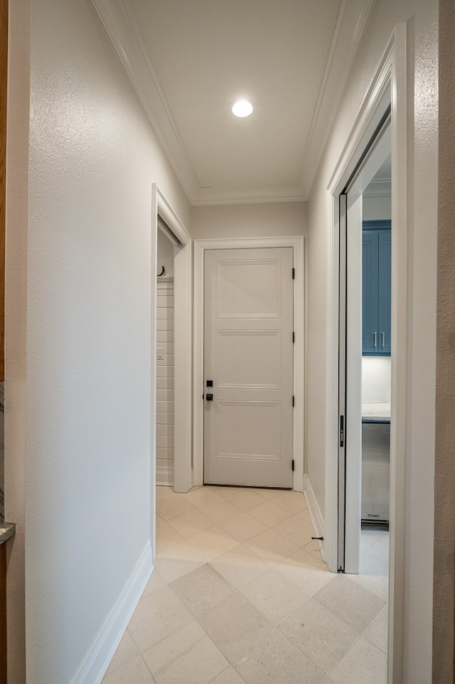 hallway featuring crown molding