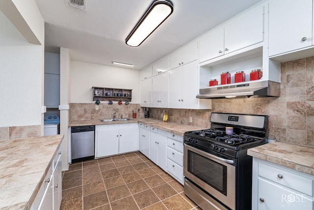 1726 S Park St, San Angelo, TX 76901 - kitchen featuring tasteful backsplash, open shelves, stainless steel appliances, under cabinet range hood, and visible vents