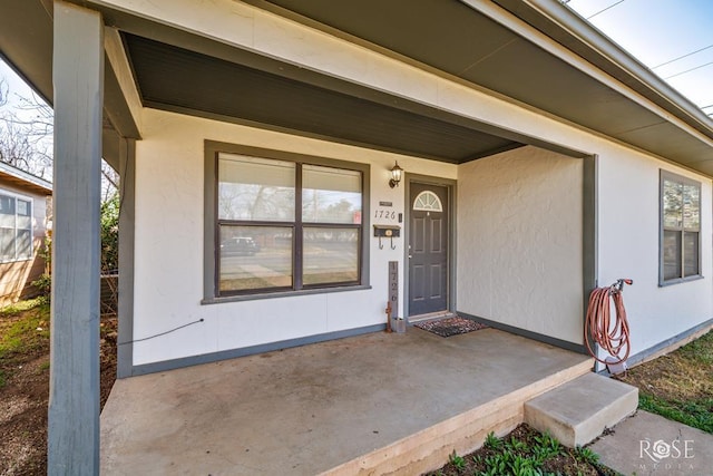 1726 S Park St, San Angelo, TX 76901 - entrance to property featuring stucco siding and a porch