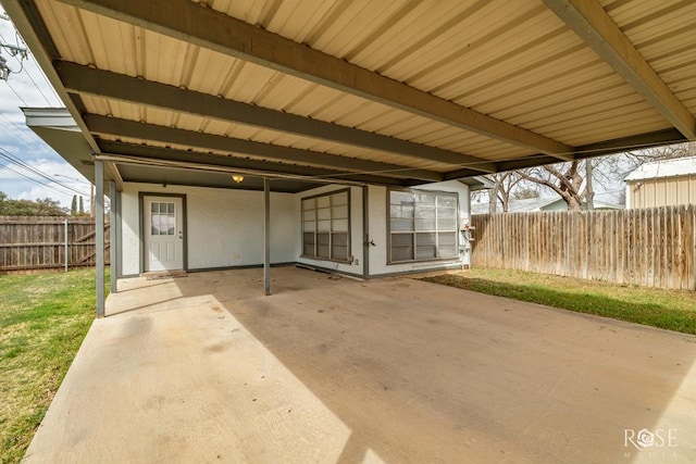 1726 S Park St, San Angelo, TX 76901 - view of patio featuring a fenced backyard and an attached carport