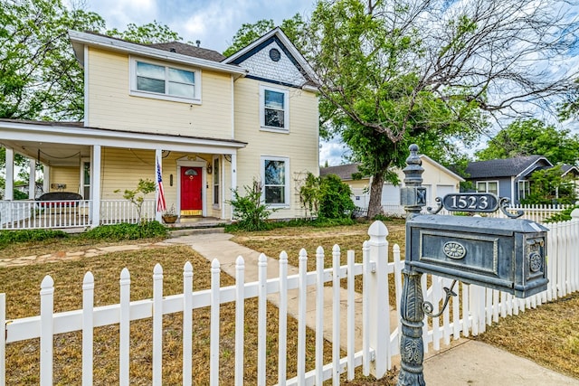 view of front of home featuring covered porch