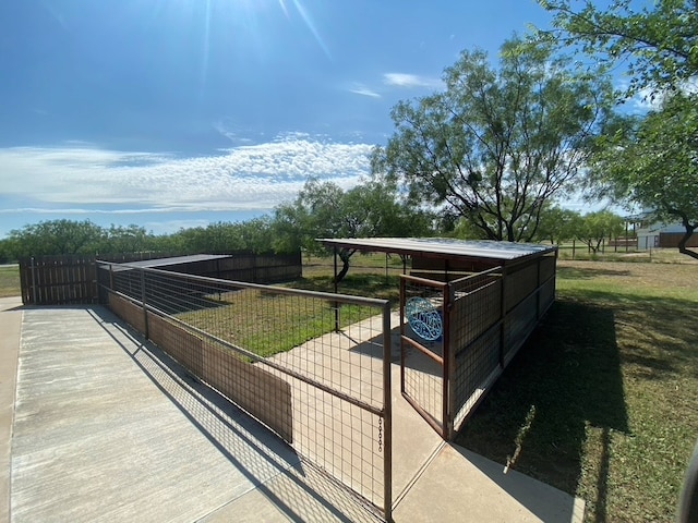 11725 Little Sorrel Trl, San Angelo, TX 76904 - view of patio / terrace featuring an exterior structure and an outbuilding
