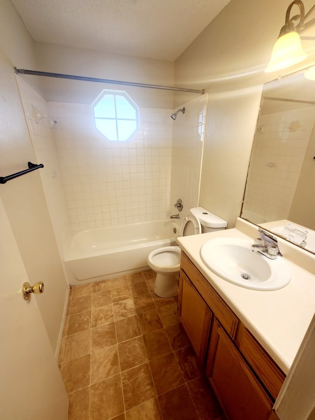 bathroom featuring vanity, toilet, and shower / washtub combination