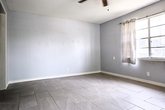 136 Arlington St, San Angelo, TX 76903 - empty room featuring a ceiling fan, baseboards, and tile patterned floors