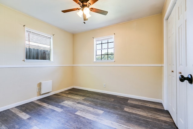 2818 Abilene St, San Angelo, TX 76901 - spare room with wood finished floors, a ceiling fan, and baseboards