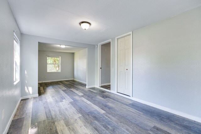 2818 Abilene St, San Angelo, TX 76901 - empty room with wood finished floors and baseboards