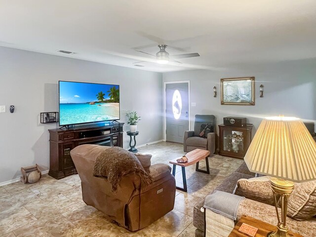 living room with ceiling fan