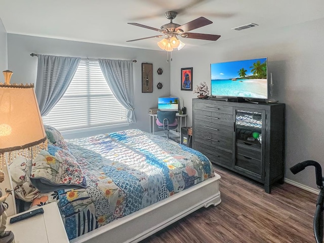 bedroom featuring hardwood / wood-style flooring and ceiling fan