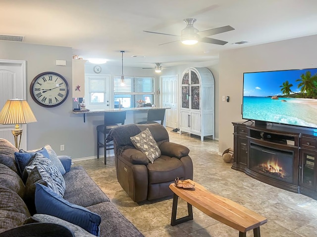 living room featuring ceiling fan