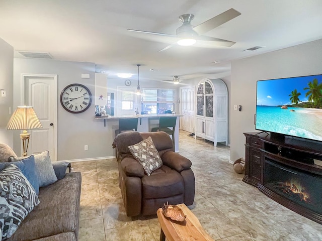 living room with ceiling fan