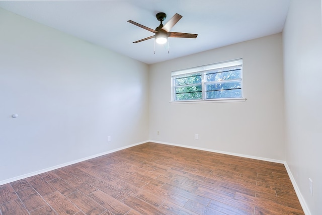 3868 Honeysuckle Ln, San Angelo, TX 76904 - empty room featuring wood finished floors, ceiling fan, and baseboards