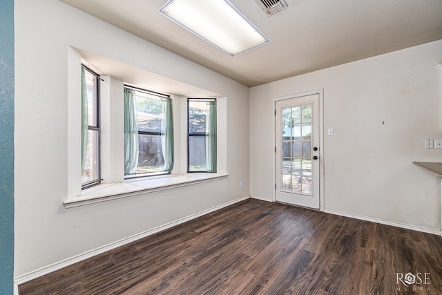3413 Sequoia Cir, San Angelo, TX 76904 - spare room featuring wood finished floors and baseboards