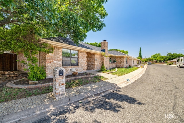 3413 Sequoia Cir, San Angelo, TX 76904 - single story home featuring a chimney and brick siding