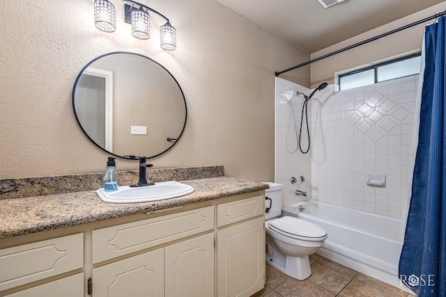 3413 Sequoia Cir, San Angelo, TX 76904 - full bath with shower / bathtub combination with curtain, vanity, toilet, tile patterned flooring, and a textured wall