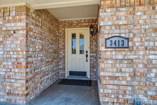 3413 Sequoia Cir, San Angelo, TX 76904 - doorway to property featuring brick siding