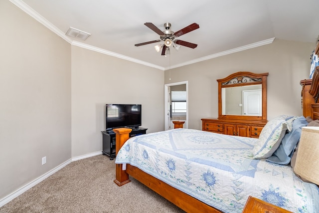 carpeted bedroom featuring ornamental molding and ceiling fan