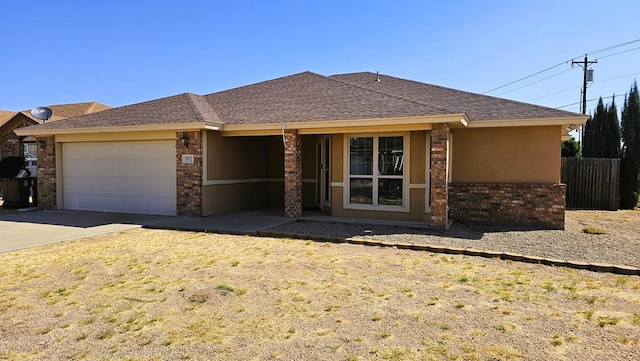 ranch-style house featuring a garage