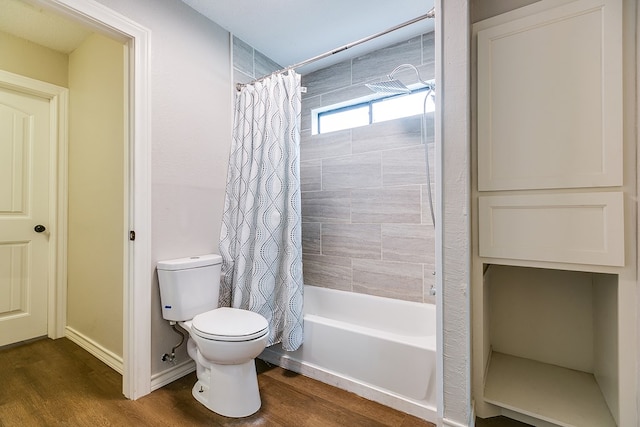 bathroom with toilet, shower / bathtub combination with curtain, baseboards, and wood finished floors