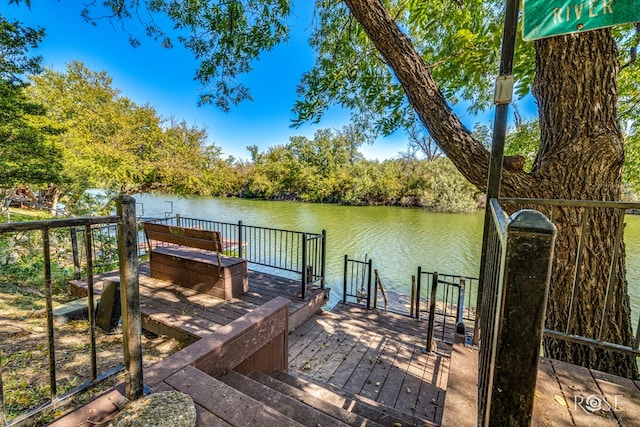 dock area with a water view