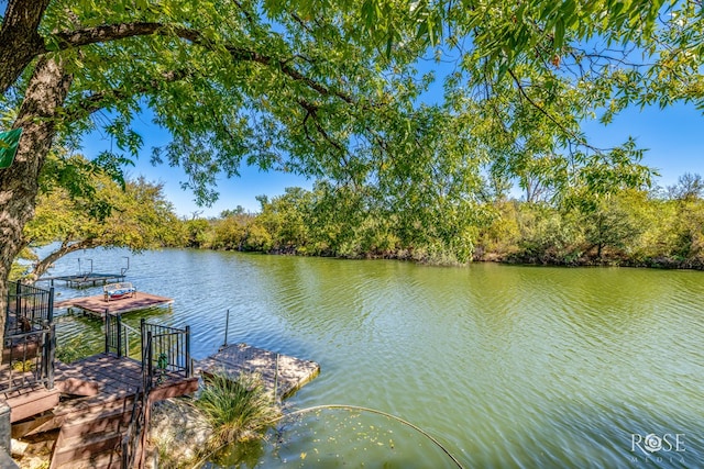 view of dock with a water view