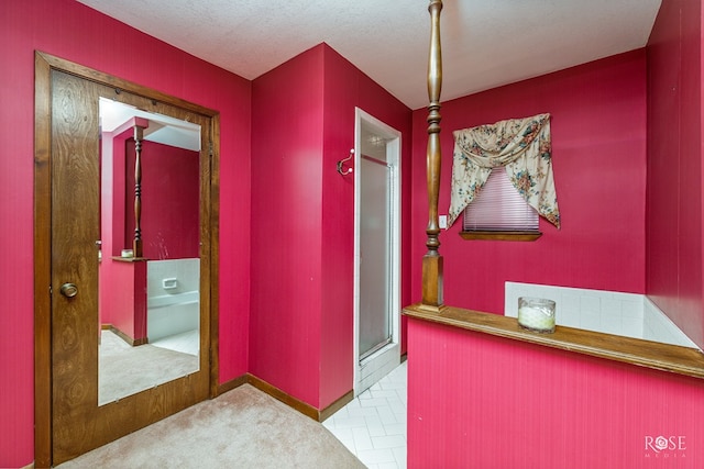 interior space featuring a textured ceiling