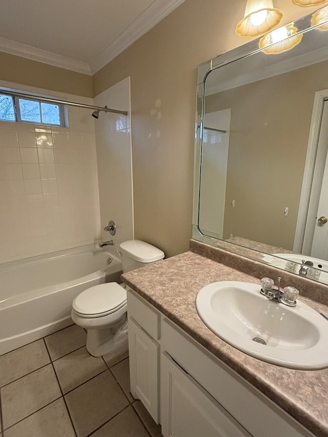 full bathroom featuring tiled shower / bath combo, vanity, toilet, crown molding, and tile patterned floors