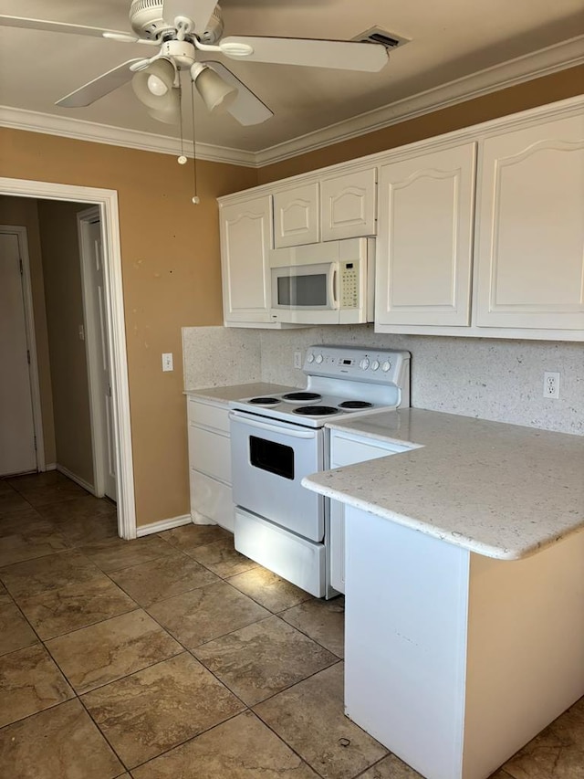 kitchen with backsplash, white cabinets, ornamental molding, light stone counters, and white appliances