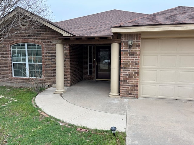 property entrance featuring a garage