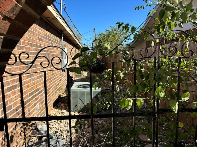 view of gate with central AC unit