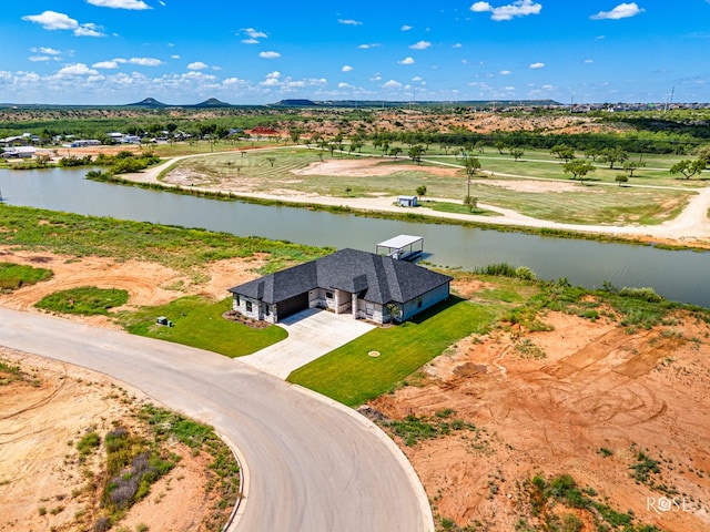 bird's eye view featuring a water and mountain view