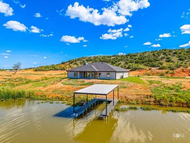 dock area with a water view