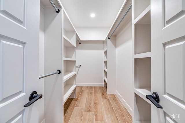 spacious closet with light wood-type flooring